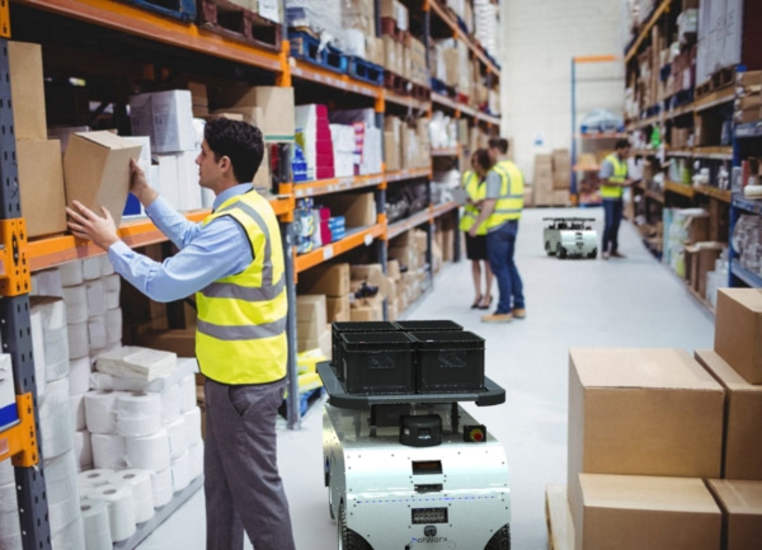 Workers picking alongside BotMovers